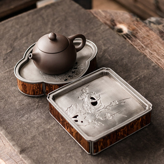 this is a tin tea tray tea boat