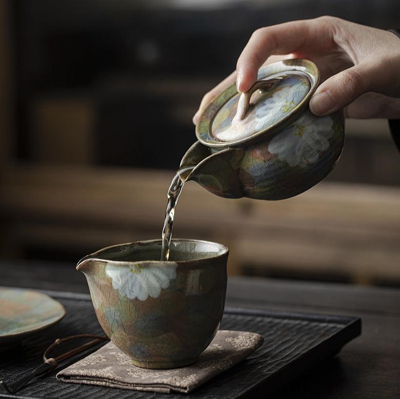 This is a ceramic teapot.this is an iced crackled baoping