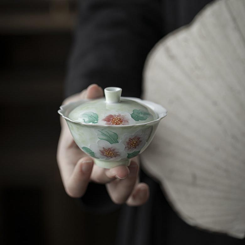 This is a Arita ware teapot. this is a ceramic gaiwan 