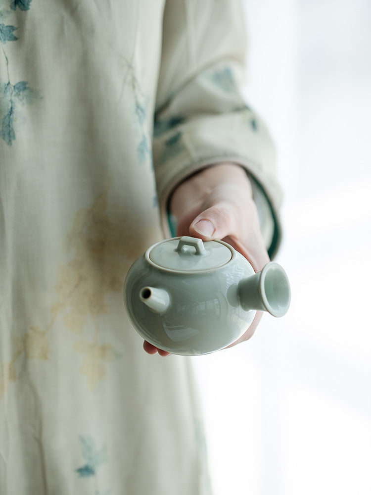 This is a ceramic teapot