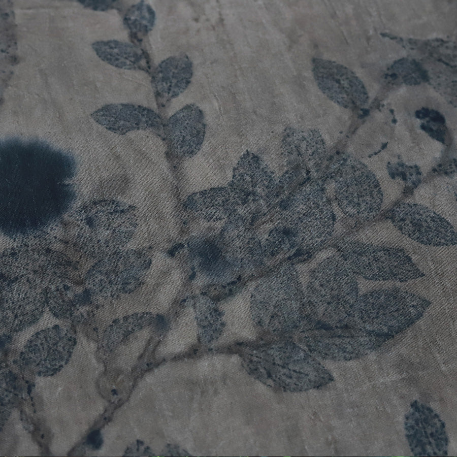 This is a plant-dyed tea mat table cloth