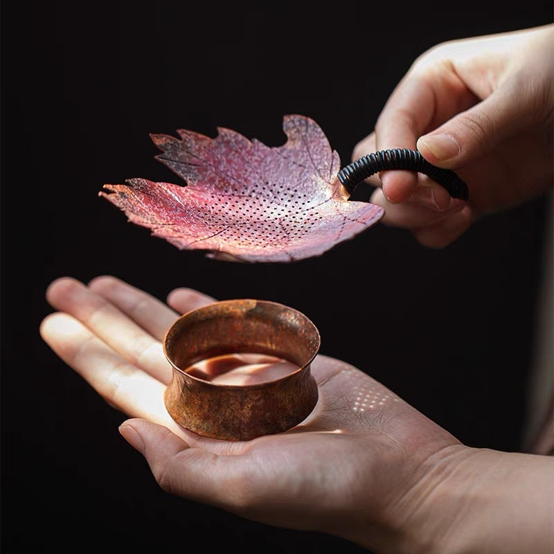 This is a copper tea filter tea funnel