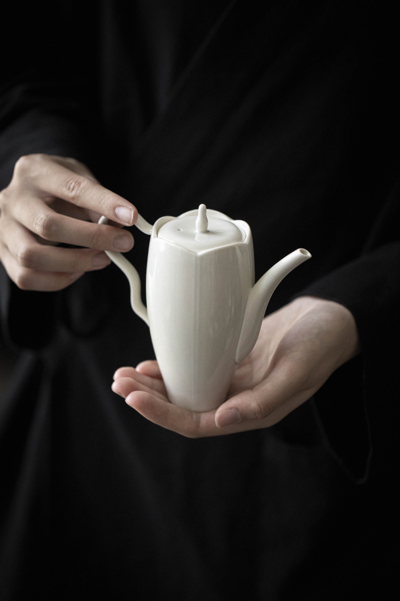 This is a ceramic teapot