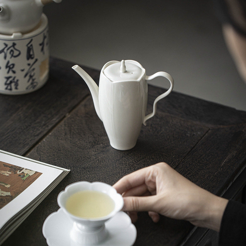 This is a ceramic teapot