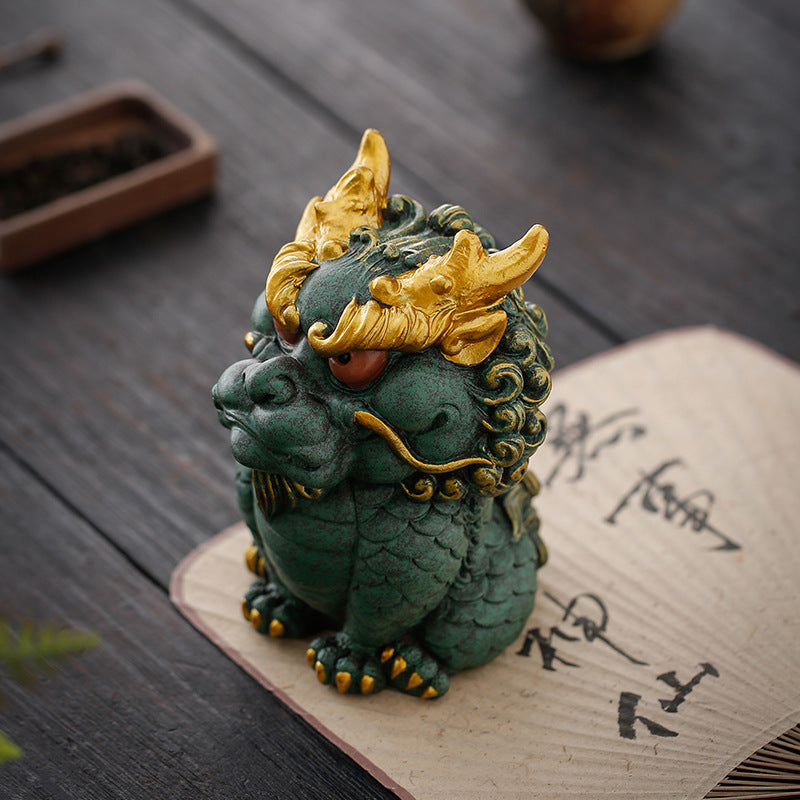 This is a pottery dragon teapet