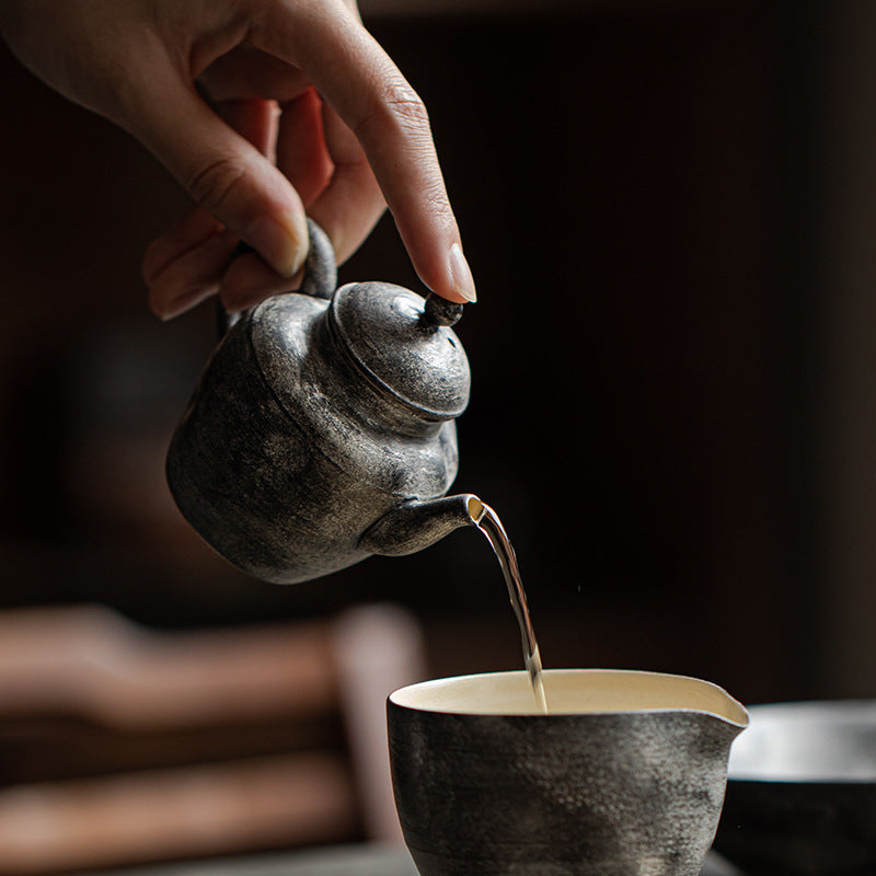 This is a ceramic teapot.this is a kohiki teapot