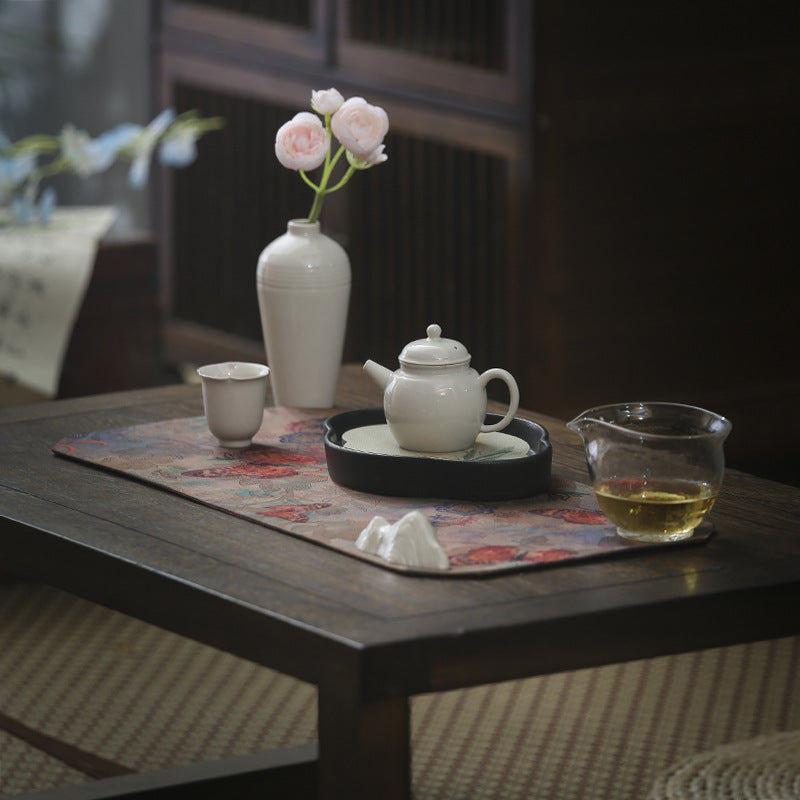 This is a gambiered canton silk xiangyunsha tea table cloth