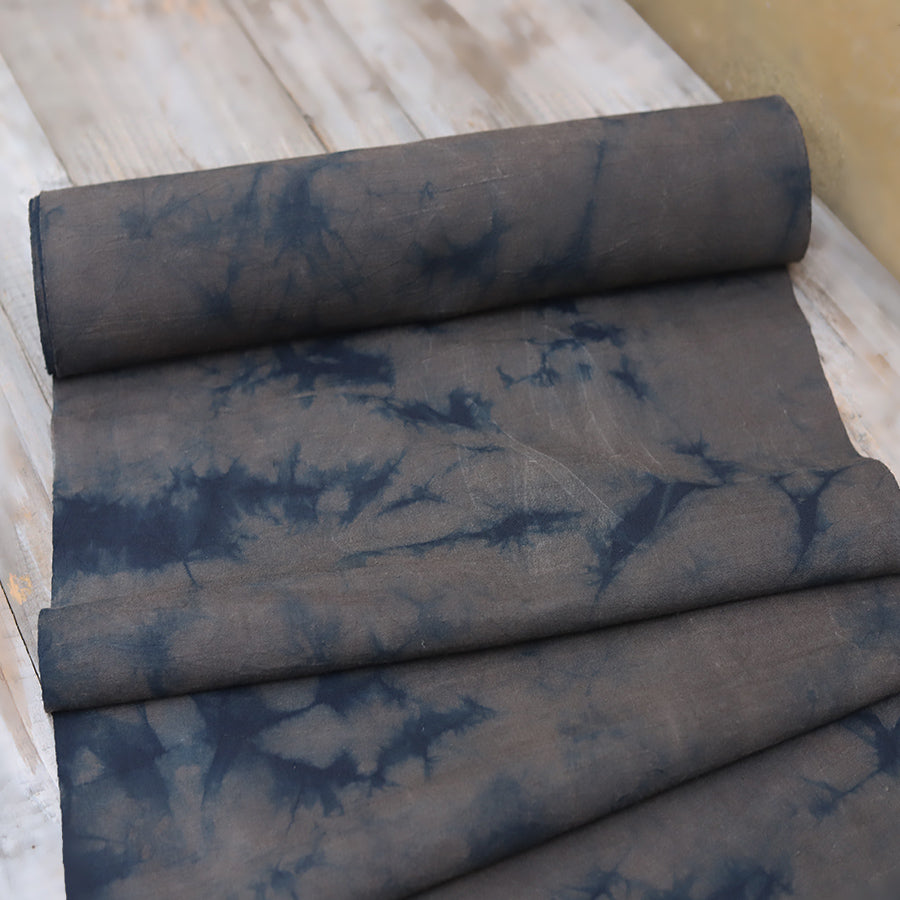 This is a plant-dyed tea mat table cloth