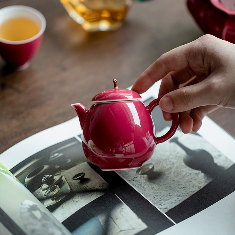 This is a ceramic teapot