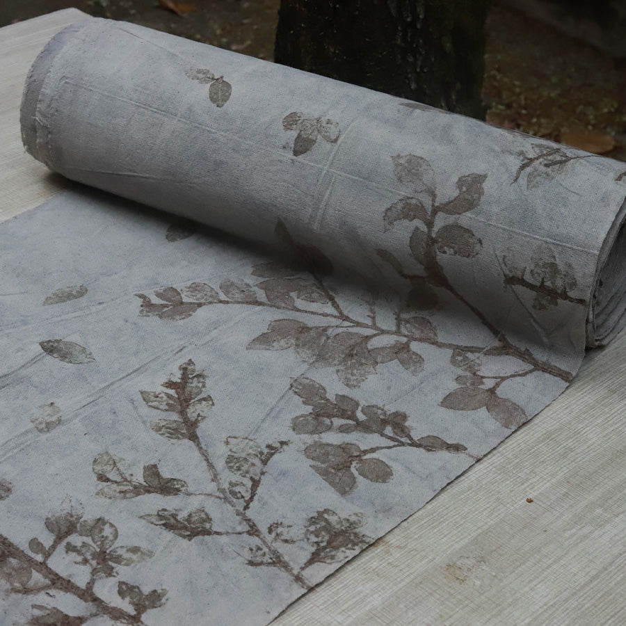 This is a plant-dyed tea mat table cloth