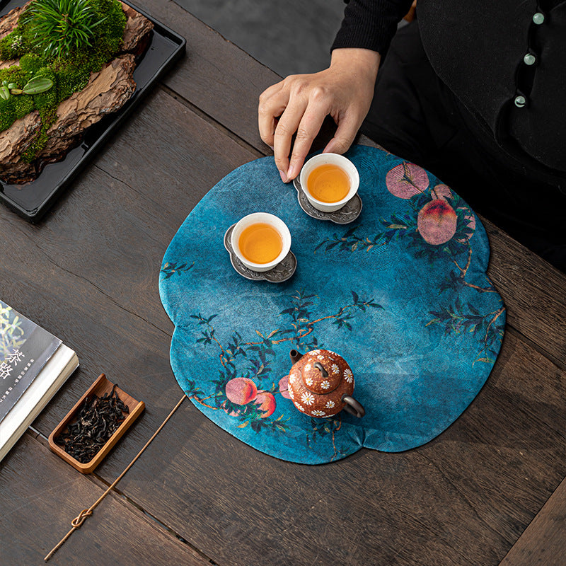 This is a silk brocade tea mat.this is a waterproof table cloth
