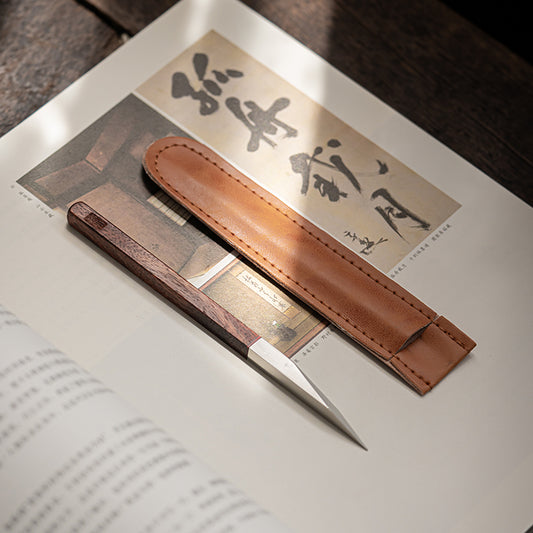 This is a sandalwood puerh cake knife tea knife tea needles