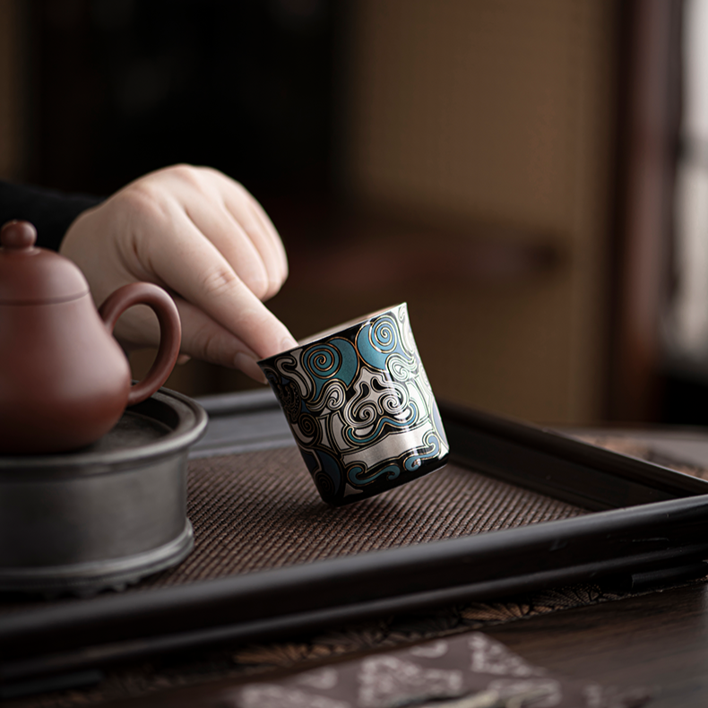 This is a gilded silver teacup. This is a ceramic teacup