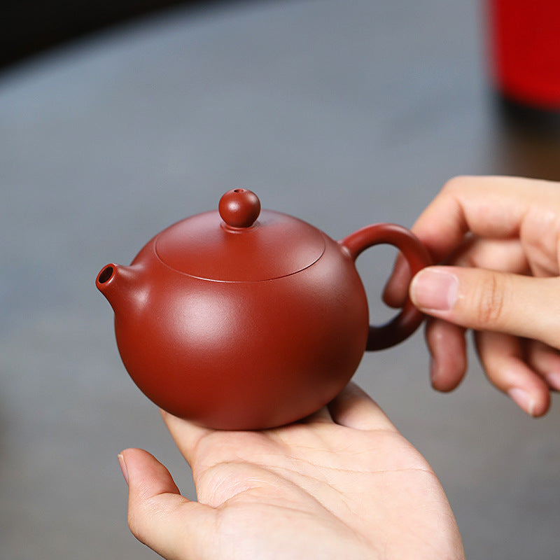 This is a pottery teapot.this is a Zhuni red clay teapot.