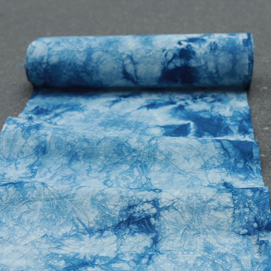 This is a indigo-dyed tea mat table cloth