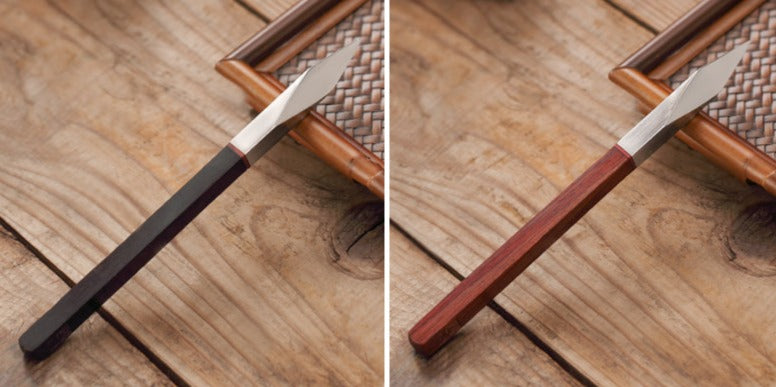 This is a sandalwood puerh cake knife tea knife tea needles