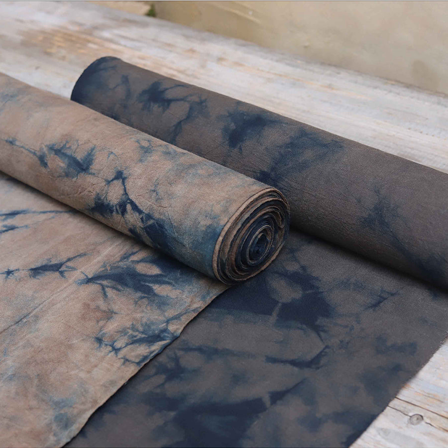 This is a plant-dyed tea mat table cloth