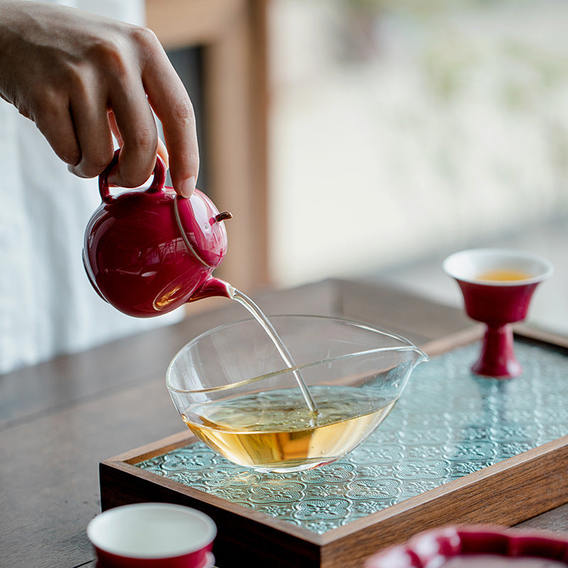 This is a ceramic teapot