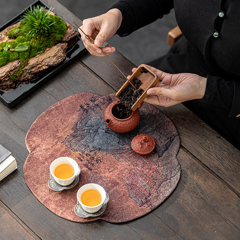 This is a silk brocade tea mat.this is a waterproof table cloth