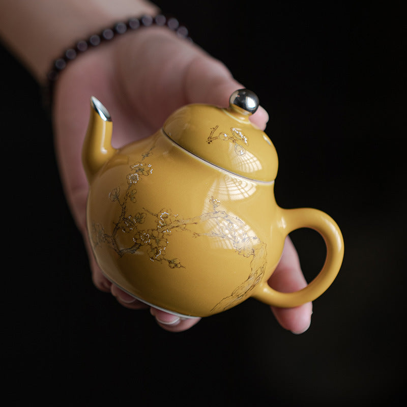 This is a ceramic teapot