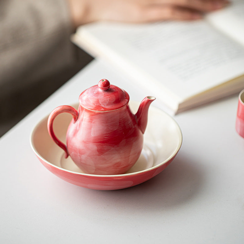 This is a ceramic teapot