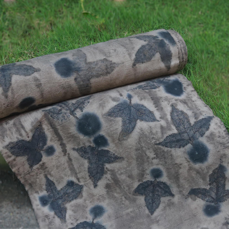 This is a plant-dyed tea mat table cloth