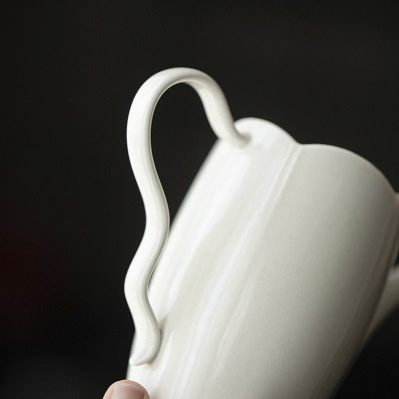 This is a ceramic teapot