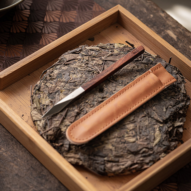 This is a sandalwood puerh cake knife tea knife tea needles