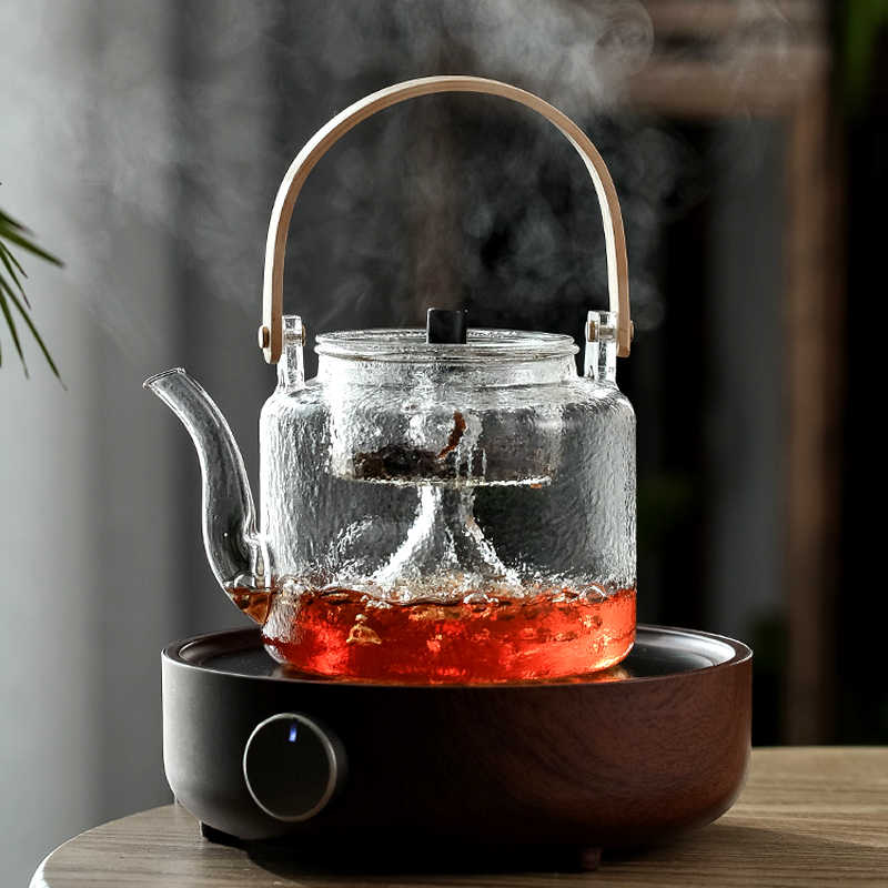 This is a glass teapot. This is a glass kettle