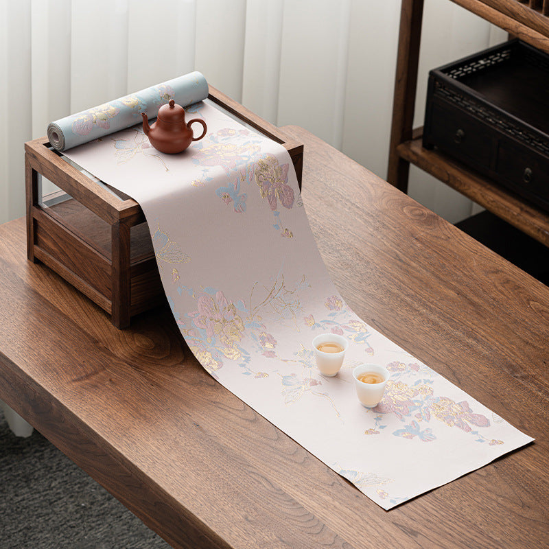 This is a silk brocade tea mat.this is a waterproof table cloth