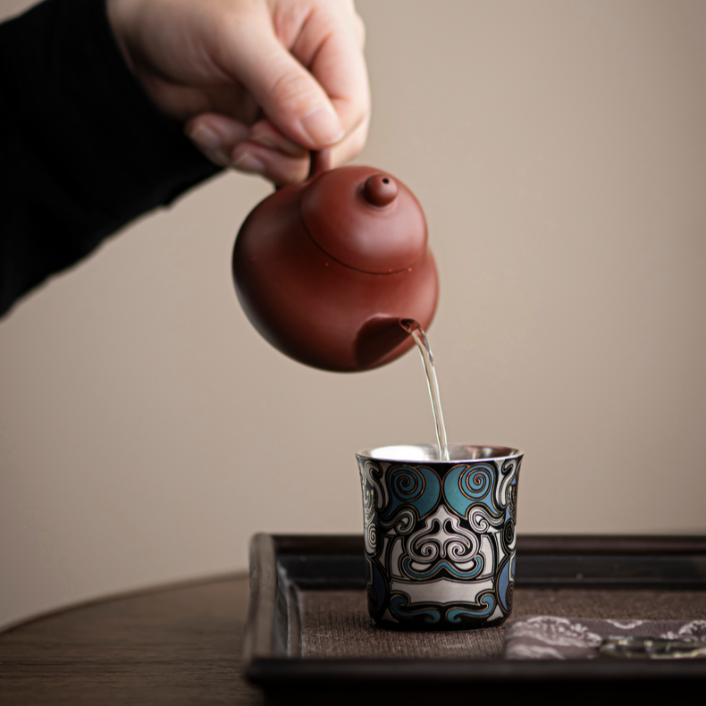 This is a gilded silver teacup. This is a ceramic teacup