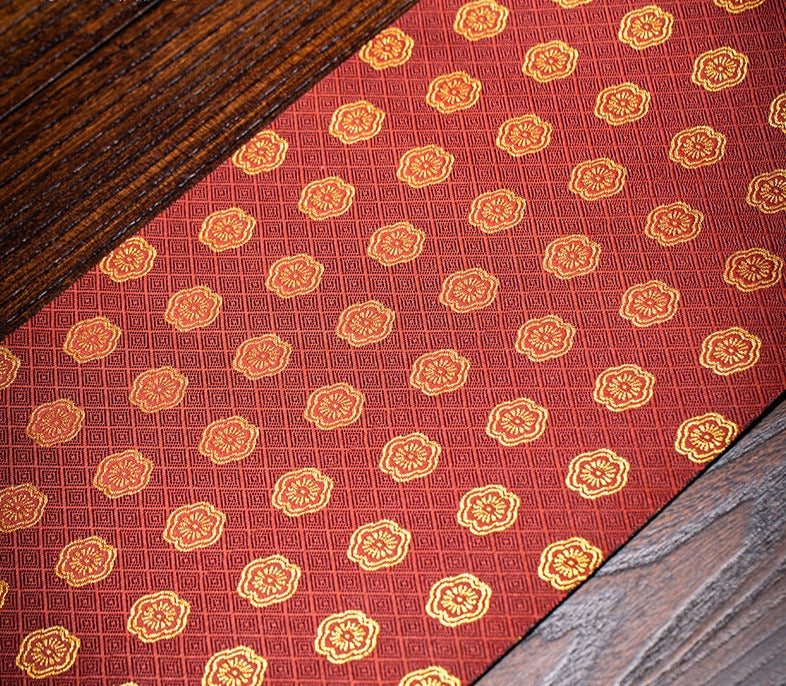 This is a brocade tea mat.this is a waterproof table cloth