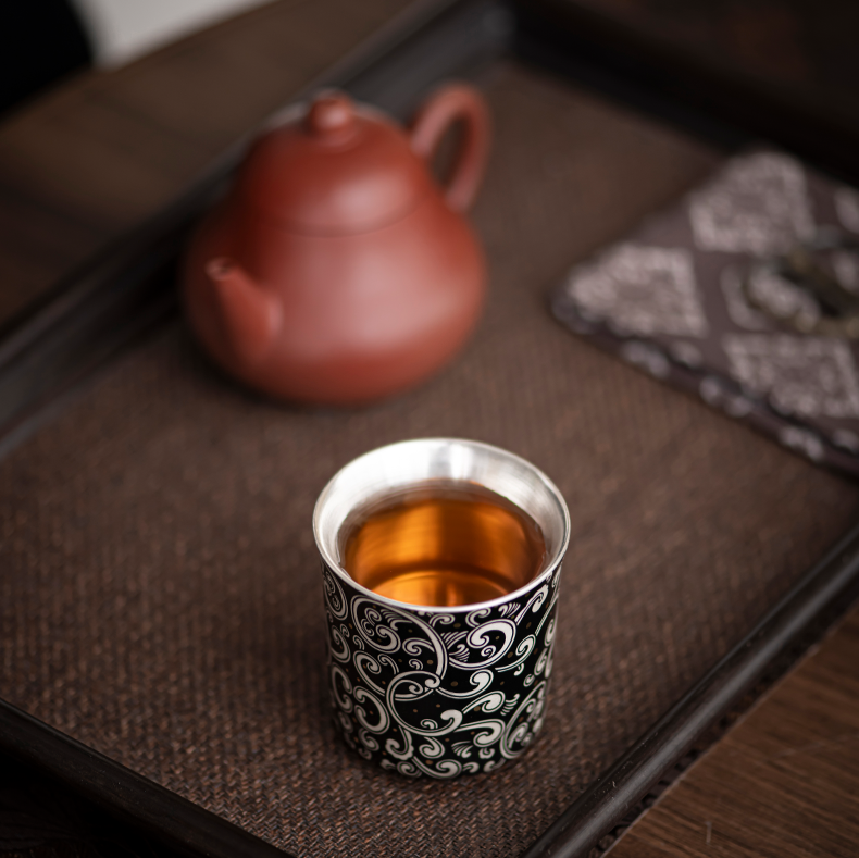 This is a gilded silver teacup. This is a ceramic teacup