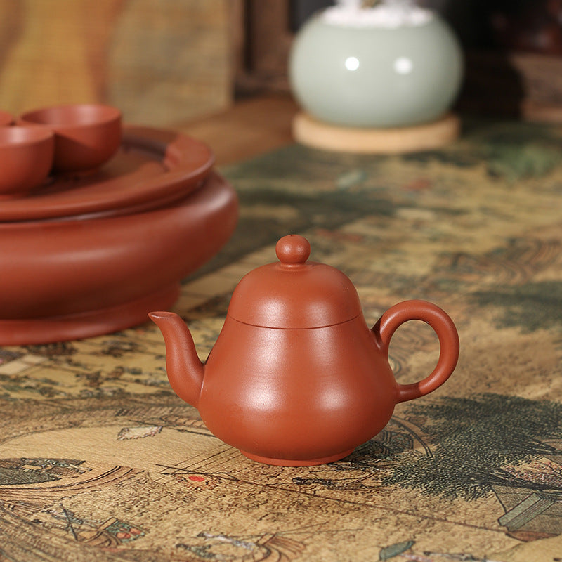 This is a Chaozhou teapot.this is Chaozhou red clay zhuni teapot