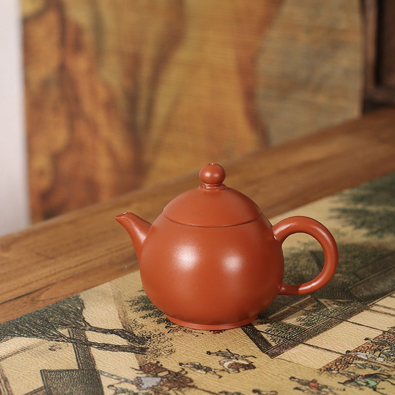 This is a Chaozhou teapot.this is Chaozhou red clay zhuni teapot