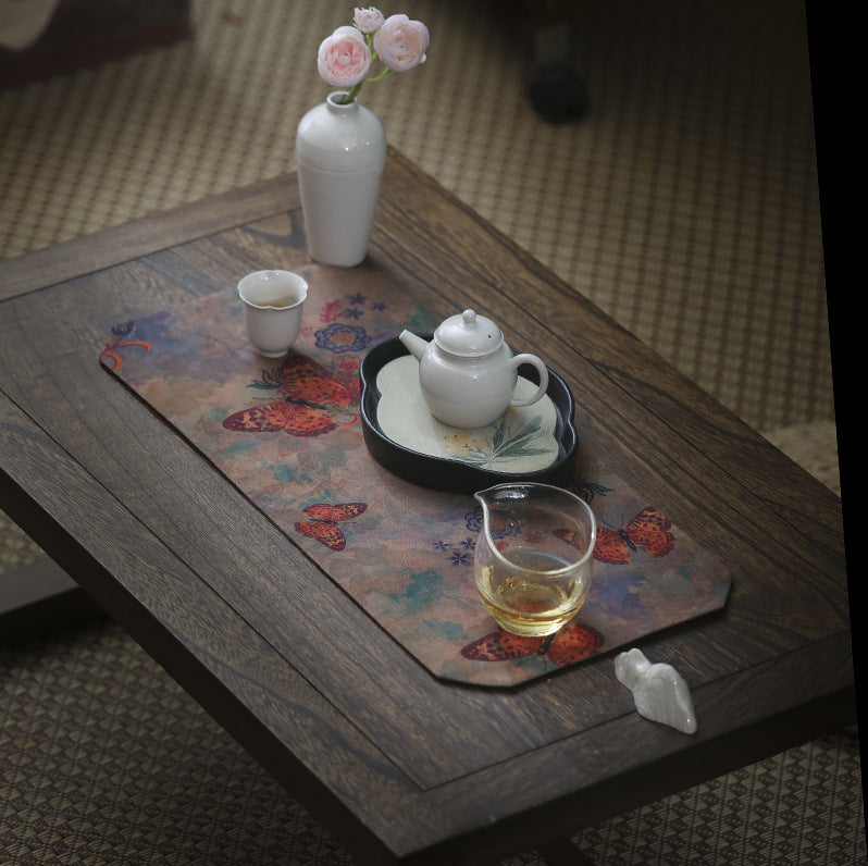 This is a gambiered canton silk xiangyunsha tea table cloth