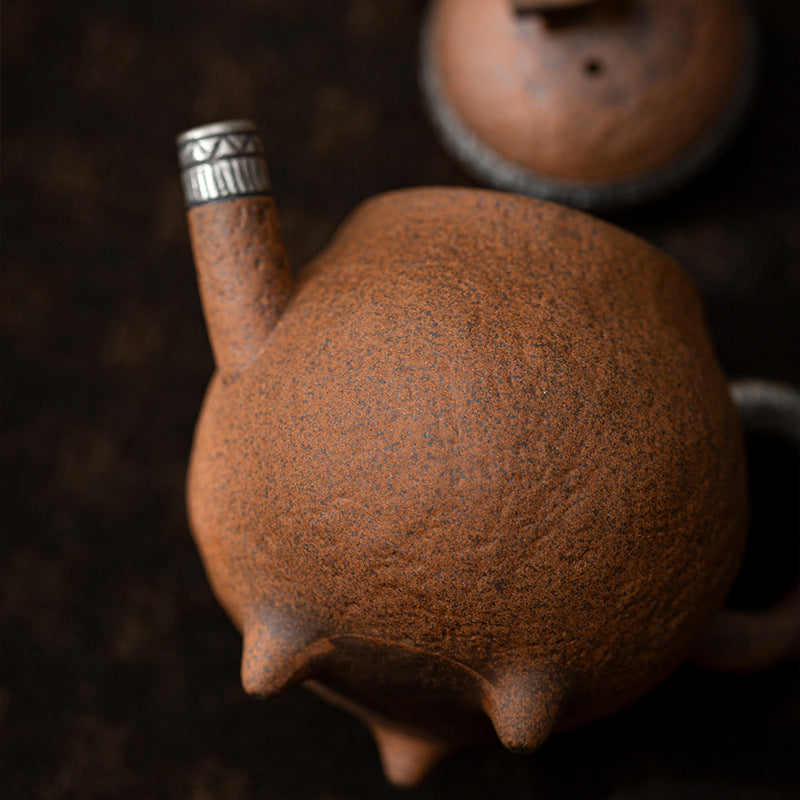 this is a pottery teapot. this is a pear teapot