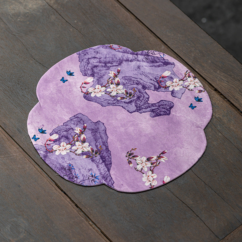This is a silk brocade tea mat.this is a waterproof table cloth