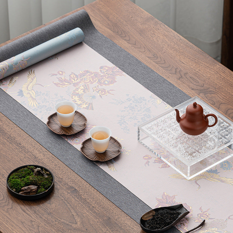 This is a silk brocade tea mat.this is a waterproof table cloth