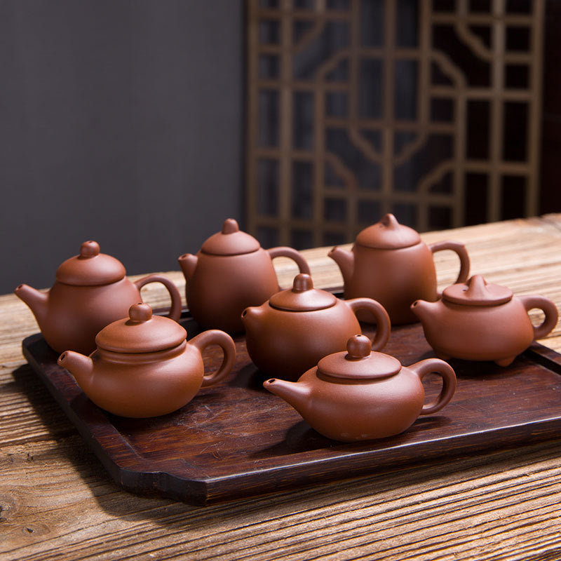 this is a mini zhuni red clay teapot