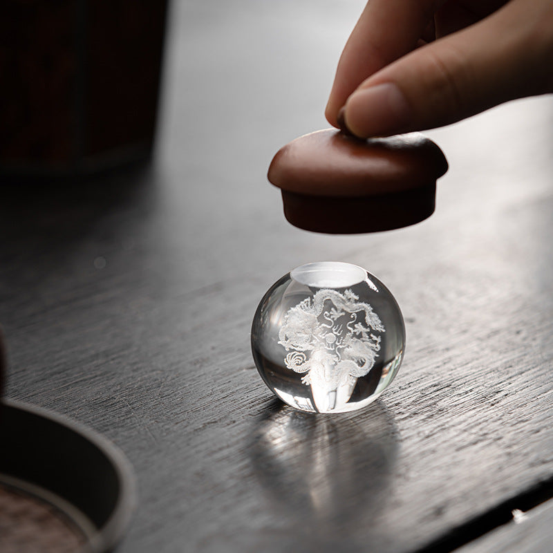 This is a crystal glass lid saucer