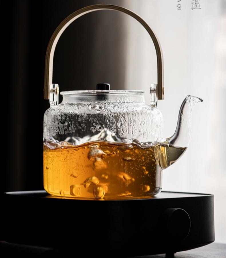 This is a glass teapot. This is a glass kettle