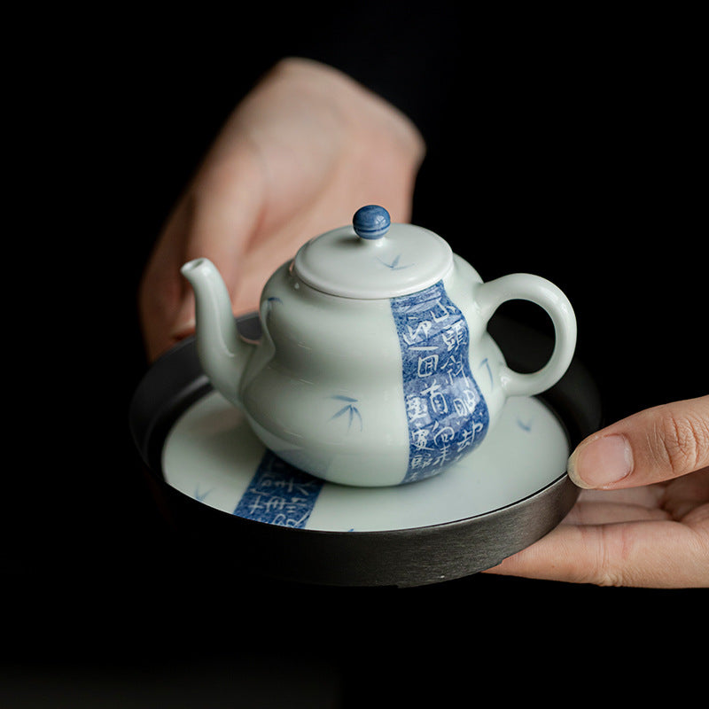 This is a ceramic teapot