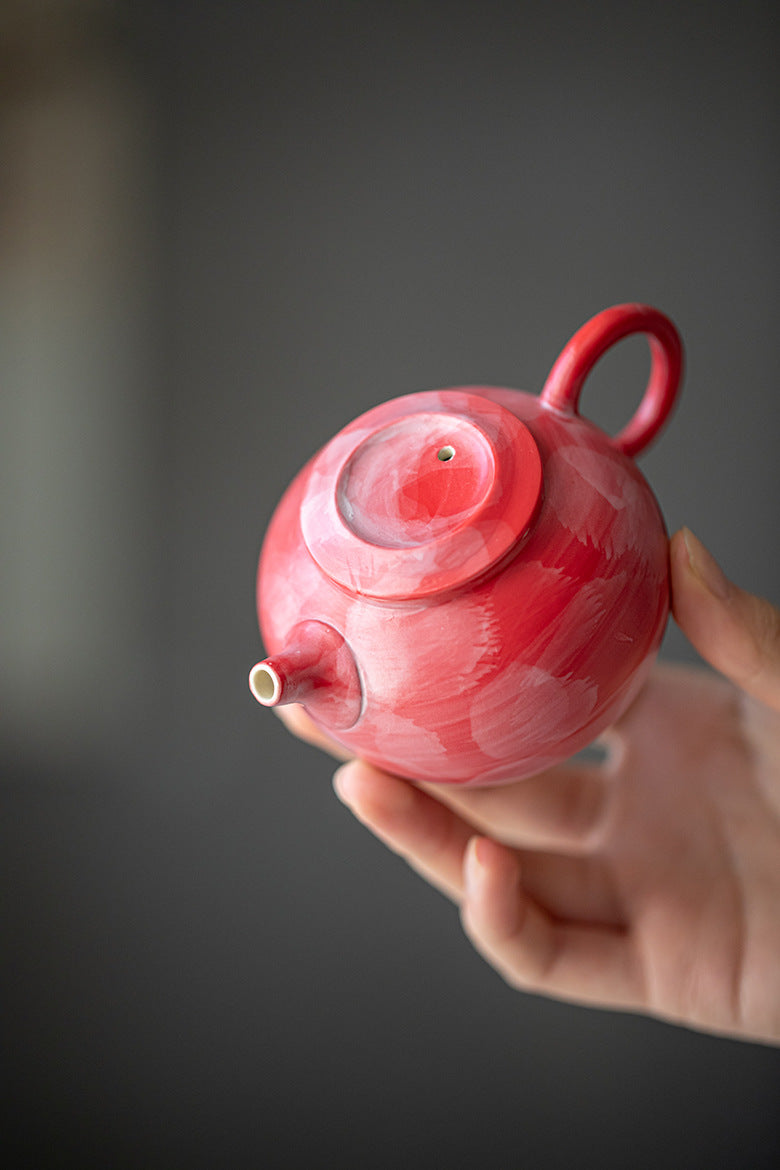 This is a ceramic teapot