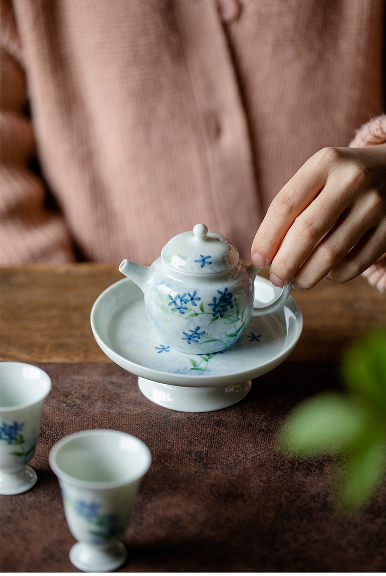 This is a ceramic teapot