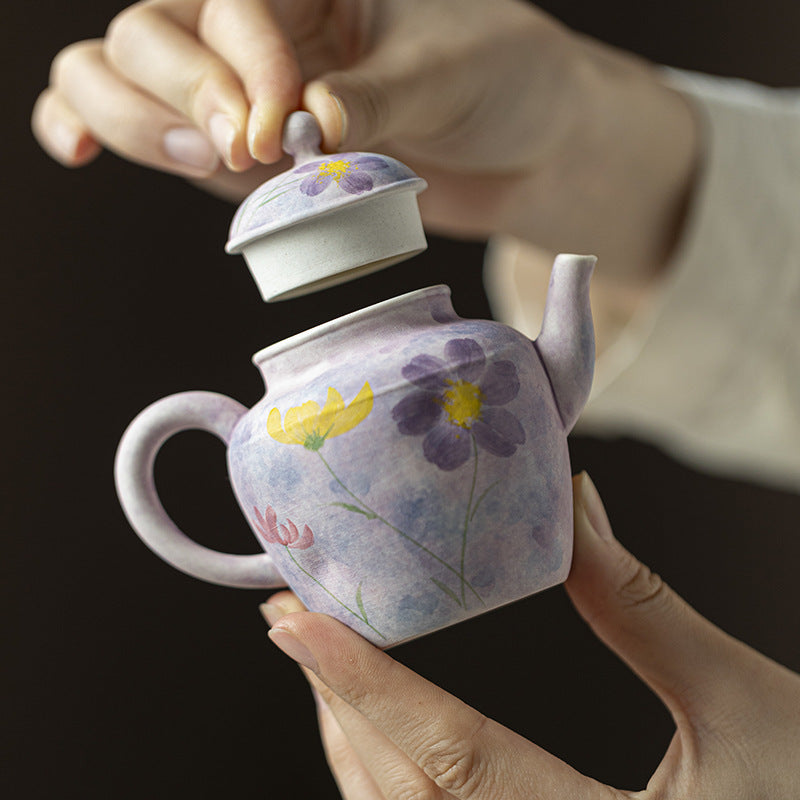 this is a purple ceramic teapot. this is Chinse kohiki teapot