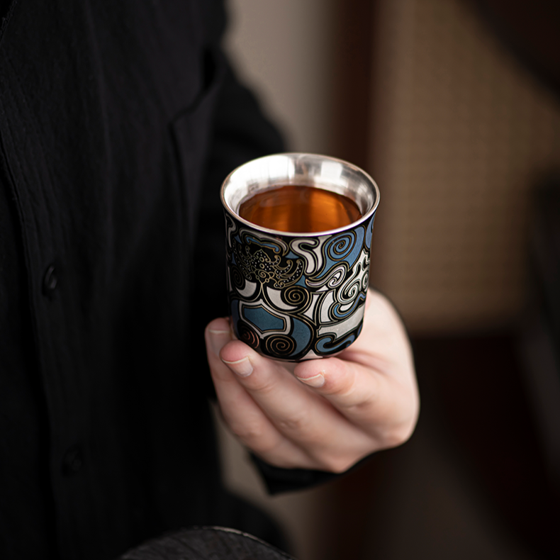 This is a gilded silver teacup. This is a ceramic teacup