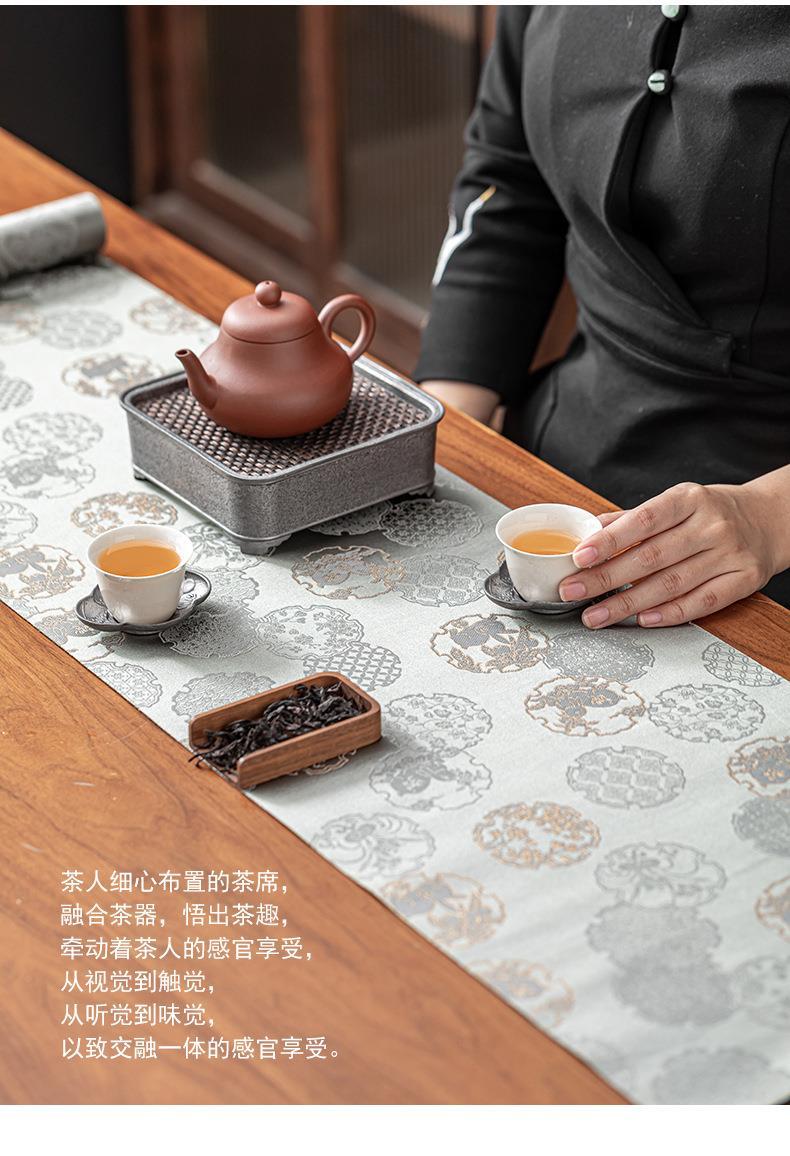 This is a silk brocade tea mat.this is a waterproof table cloth