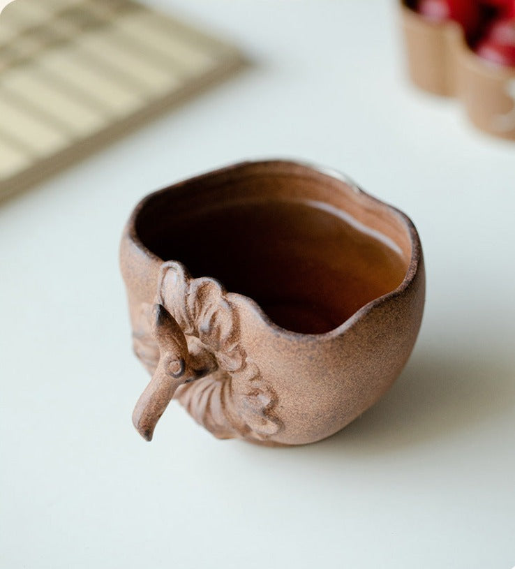 This is a pottery teacup