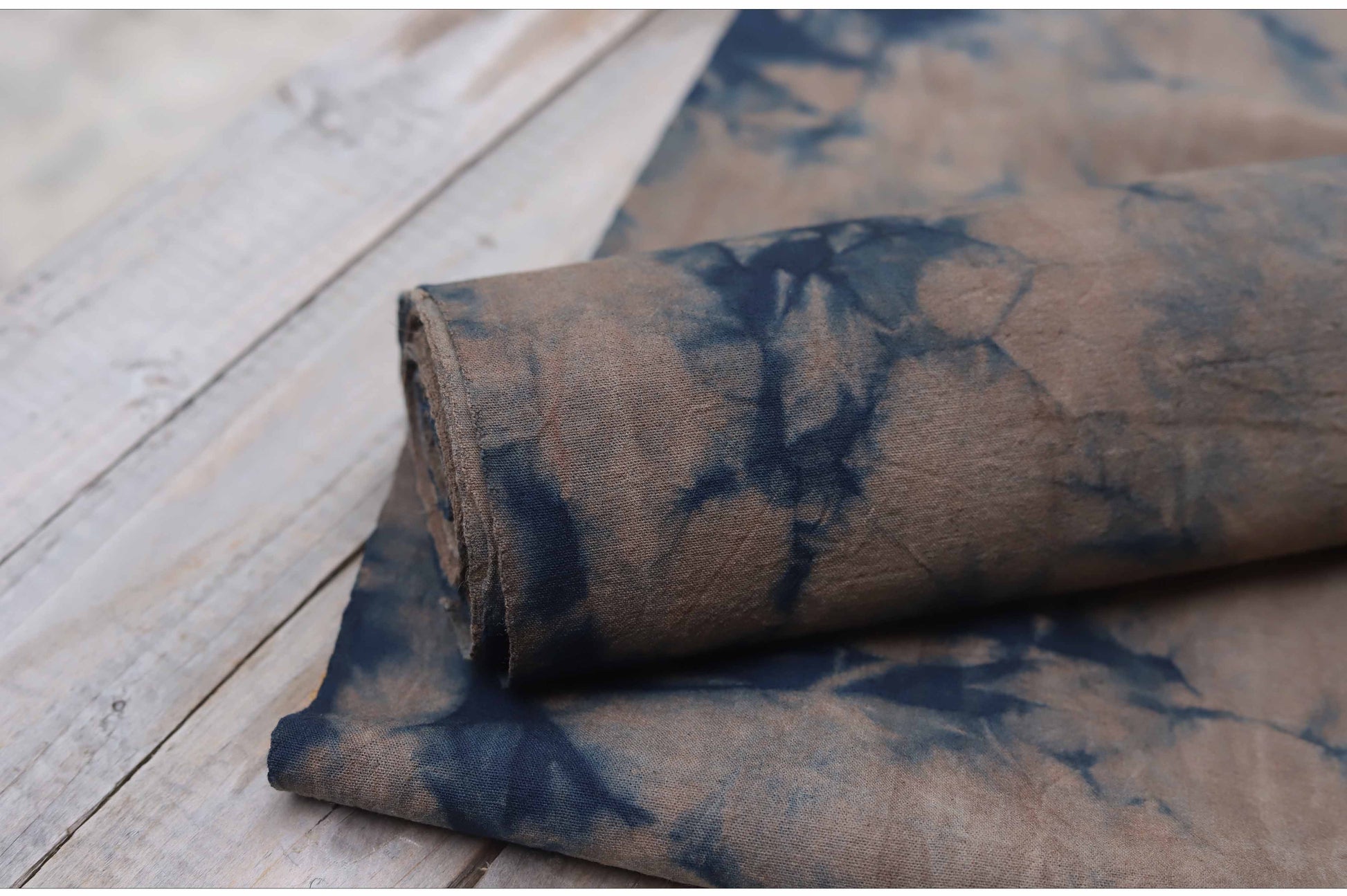 This is a plant-dyed tea mat table cloth